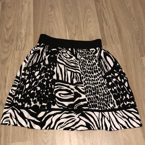 *TWO* skirts. Yellow size 4, black side Small. - Picture 9 of 9